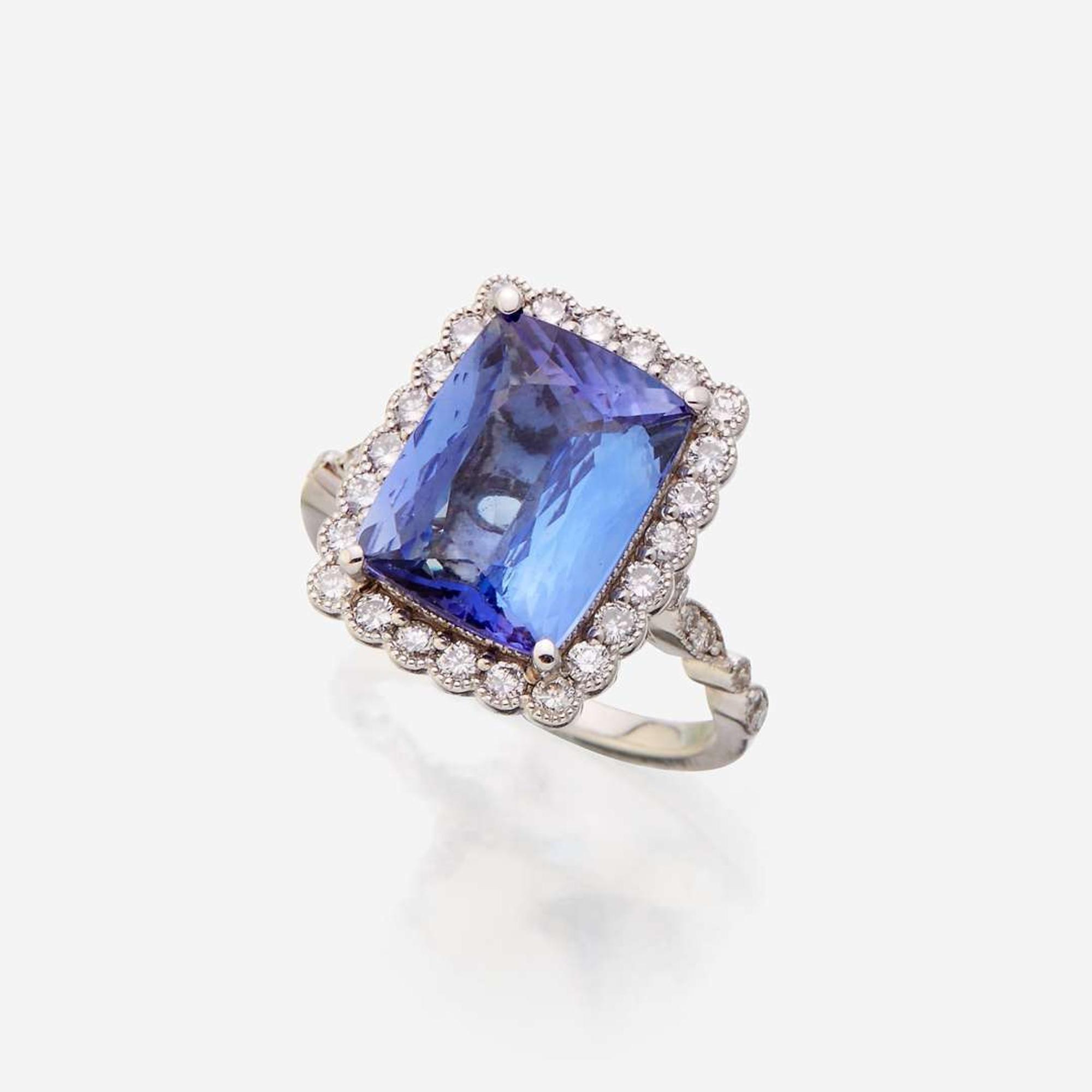 A tanzanite, diamond, and eighteen karat white gold ring