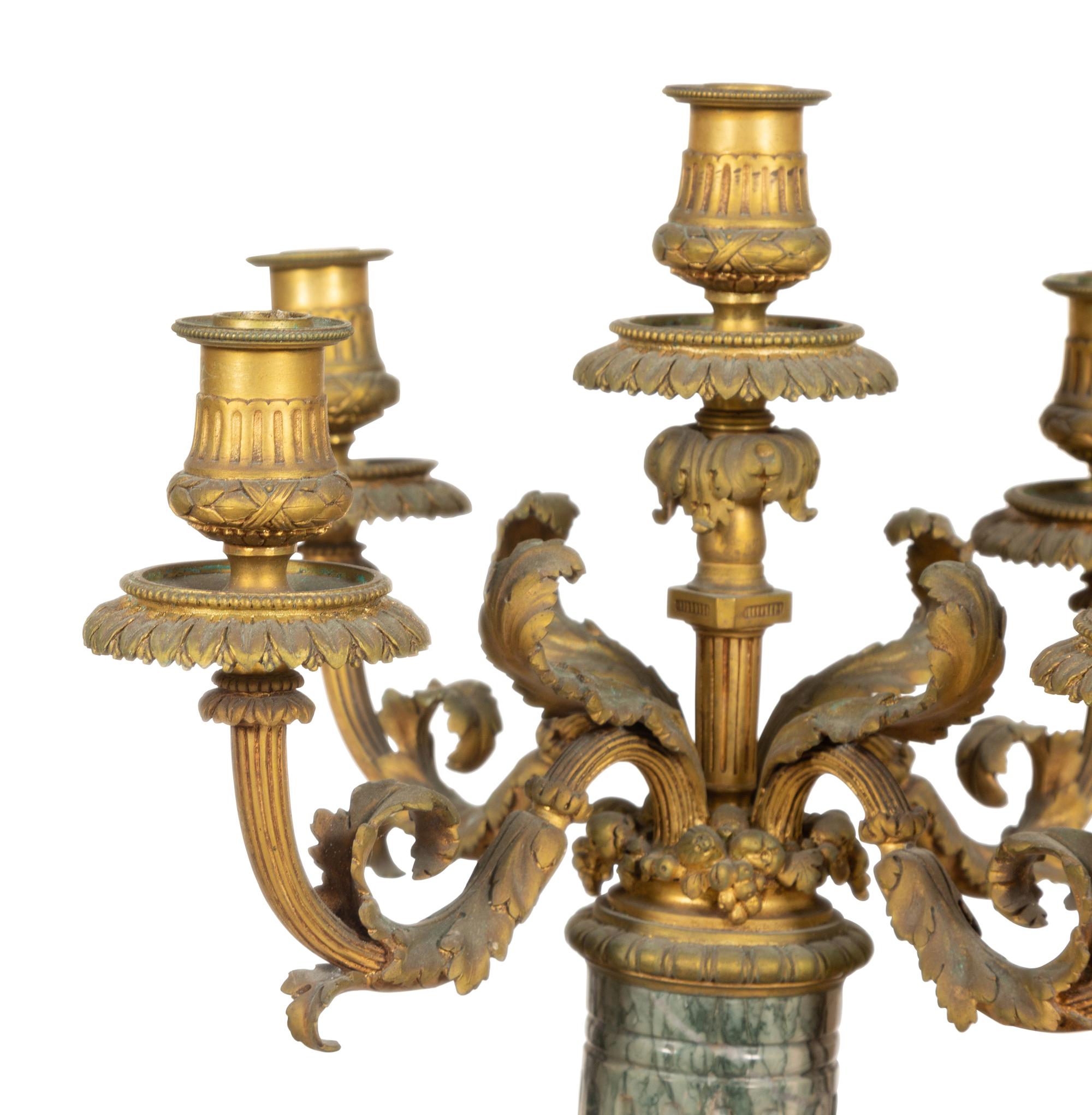 A Pair of Louis XV Style Gilt Bronze and Marble Five-Light Candelabra