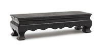 A Chinese Black Hardstone Stand Length 8 1/4 inches. — 20TH CENTURY