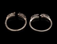 A Pair of Chinese Silver 'Dragon' Bangles