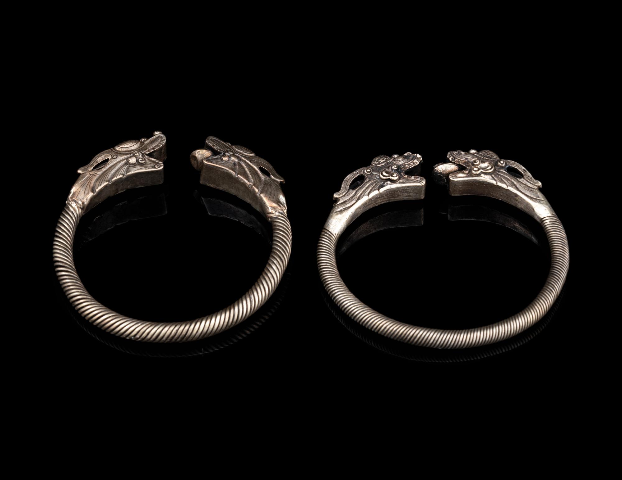 A Pair of Chinese Silver 'Dragon' Bangles