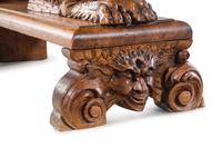 An Italian Renaissance Revival Carved Walnut Cassone on Stand