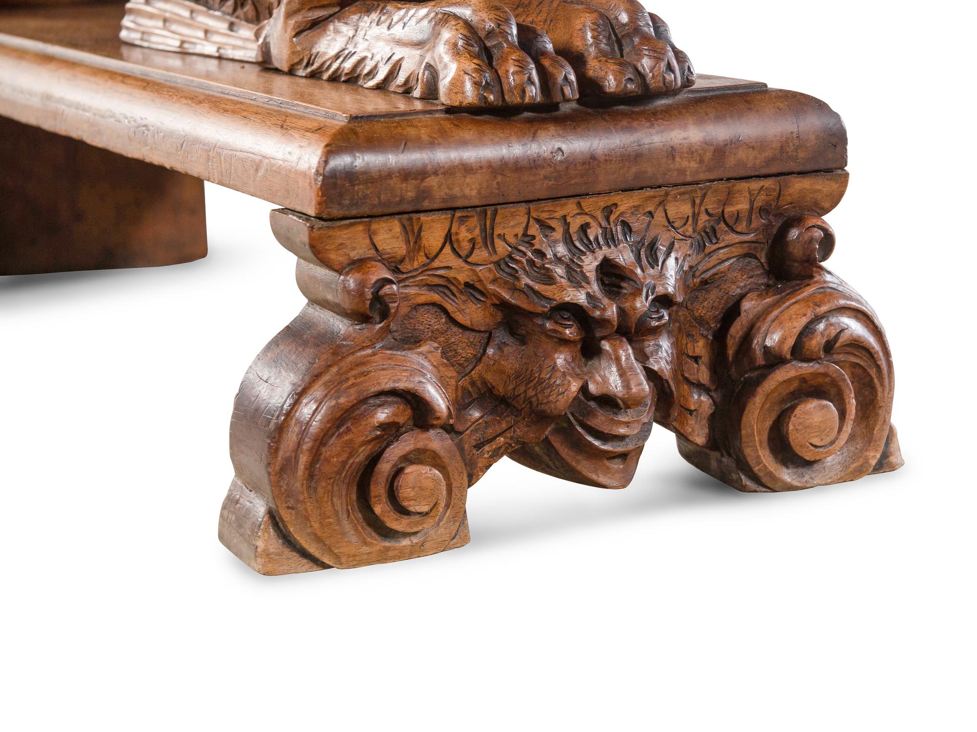 An Italian Renaissance Revival Carved Walnut Cassone on Stand