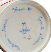 A Sevres Porcelain Jeweled Cup and Saucer, Diameter of saucer 5 1/2 inches.
