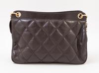 A Chanel Brown Leather Quilted Handbag, 12" x 8" x 3.5"; Strap drop: 10".