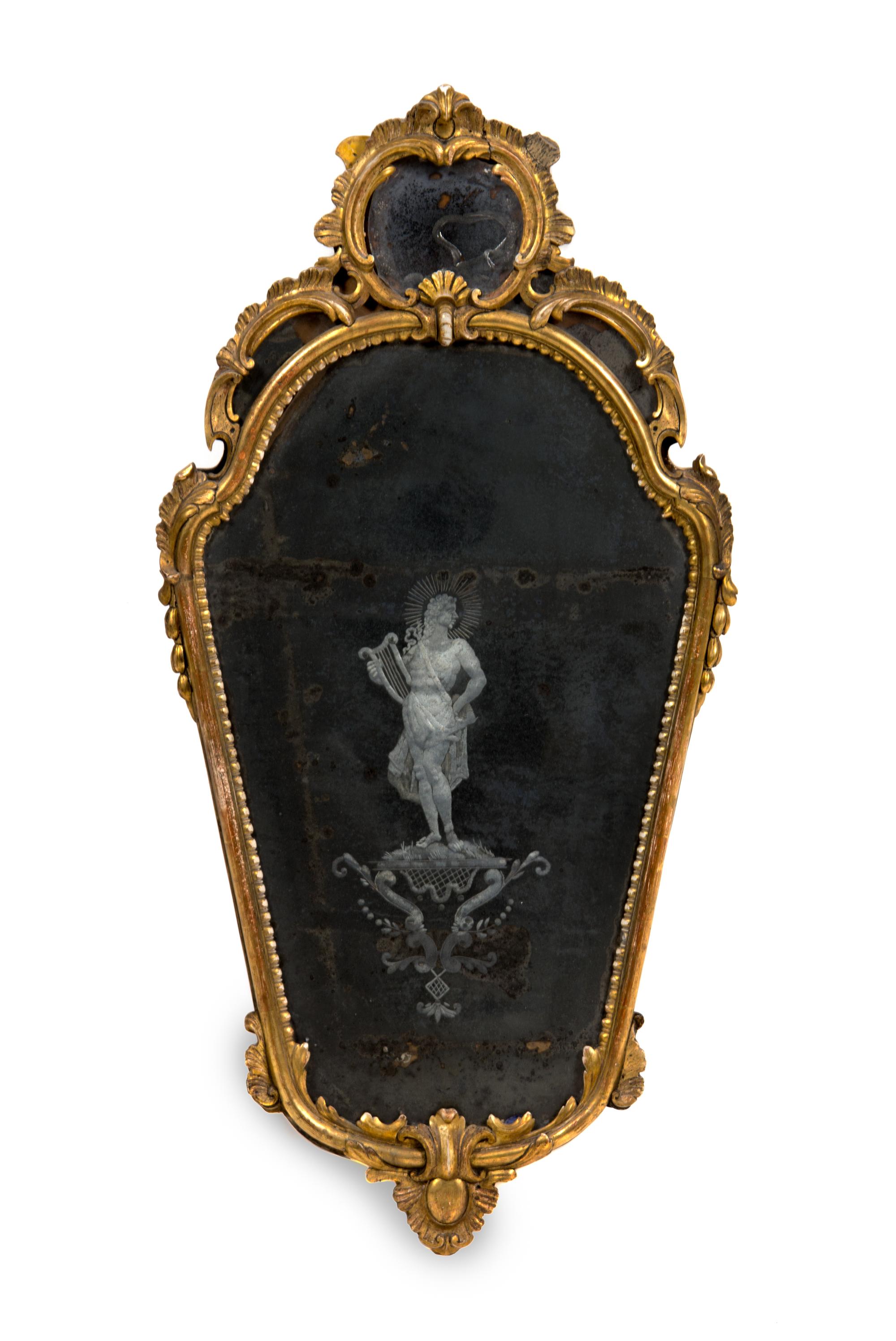 A Venetian Giltwood Mirror Height 35 x width 18 inches.