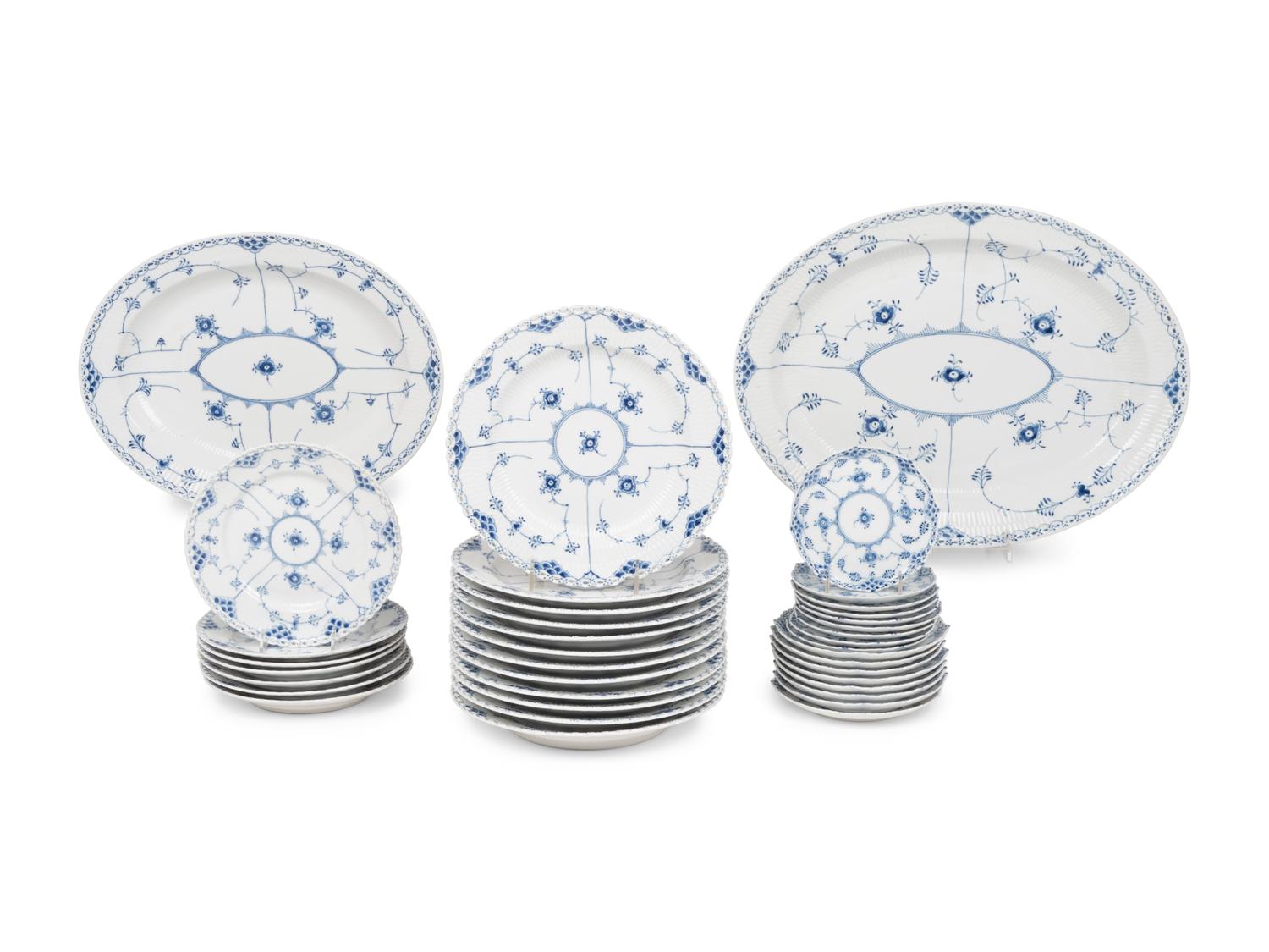A Royal Copenhagen Blue Fluted Full Lace Porcelain Dinner Service