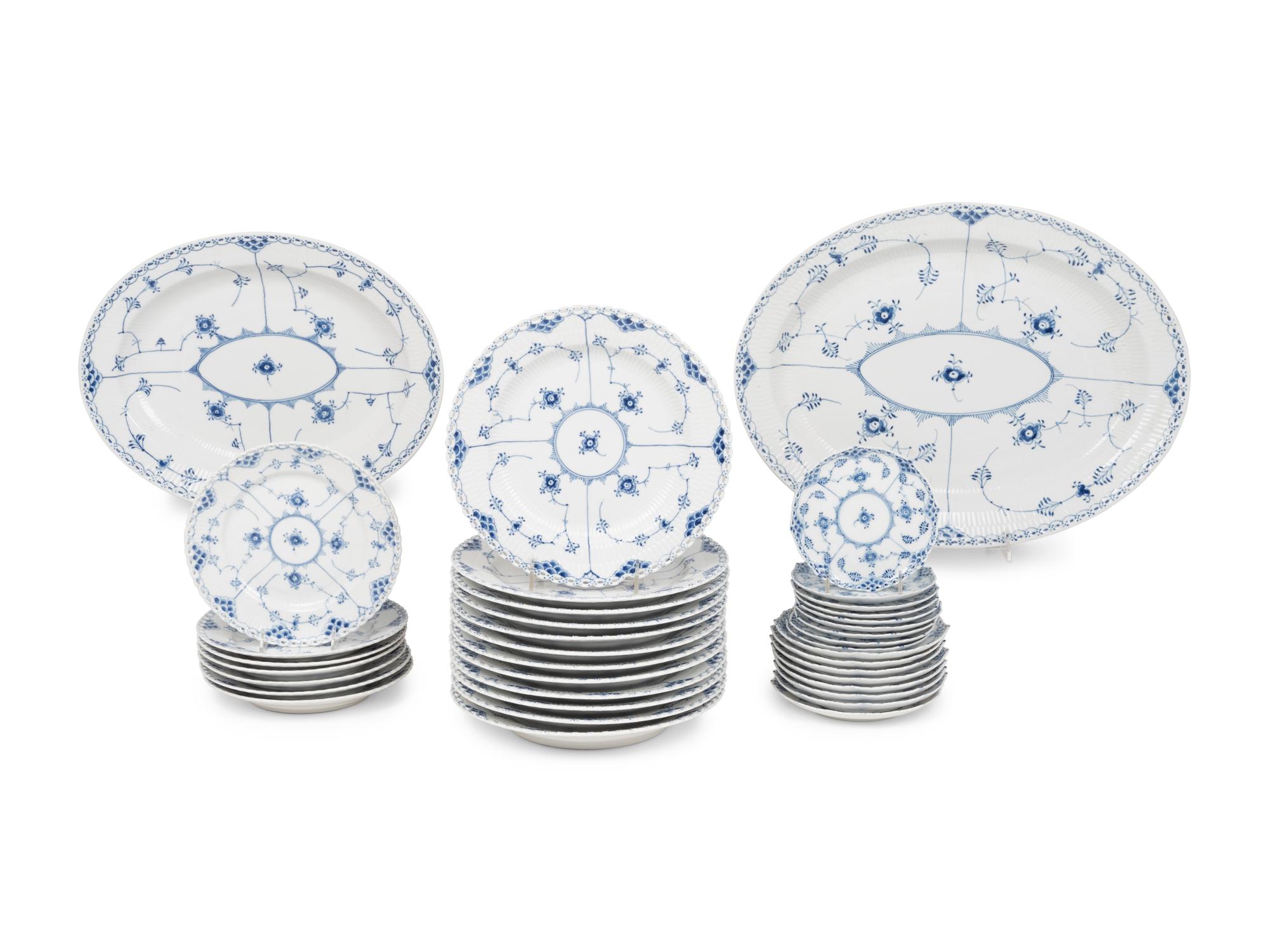 A Royal Copenhagen Blue Fluted Full Lace Porcelain Dinner Service