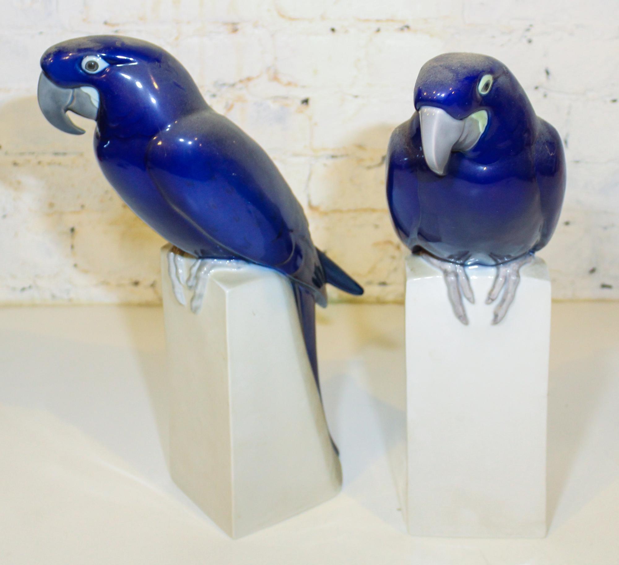 A Pair of Royal Copenhagen Parrots. Height 16 1/4 inches.
