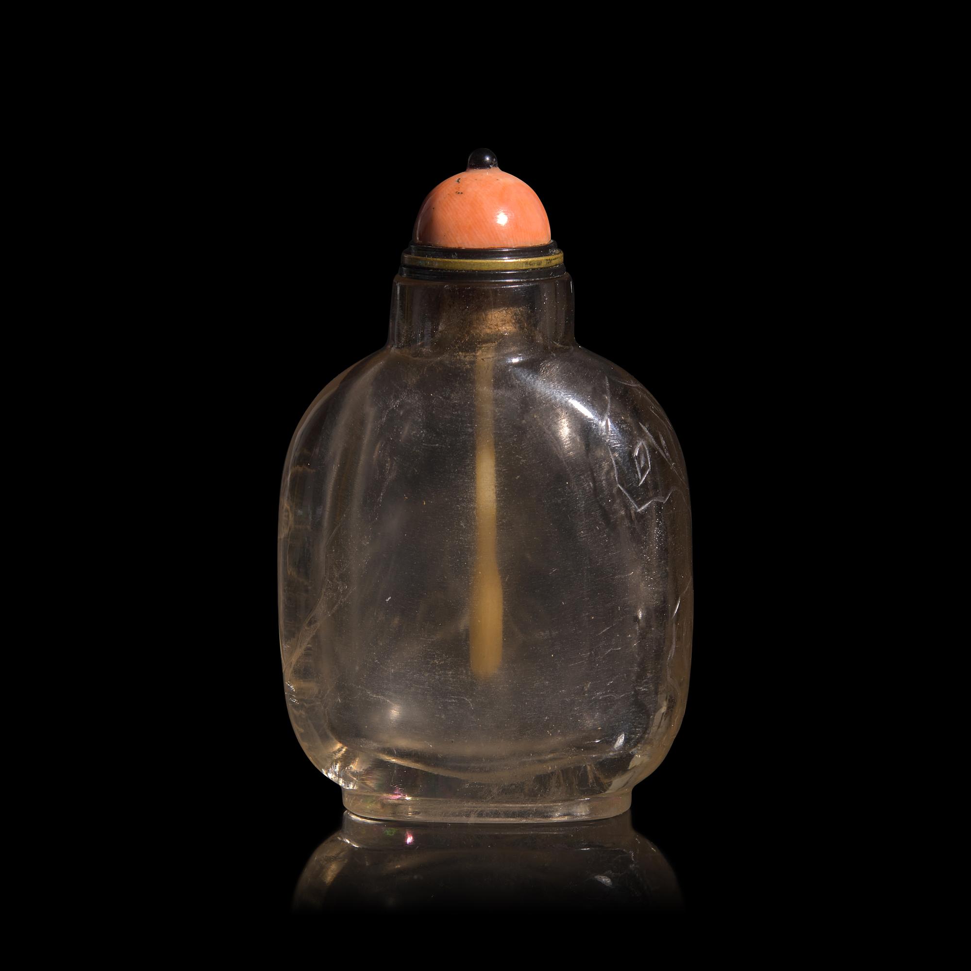 A Chinese Carved Smokey Quartz Snuff Bottle