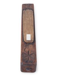 A Carved Wooden Folk Art Knife Sharpener