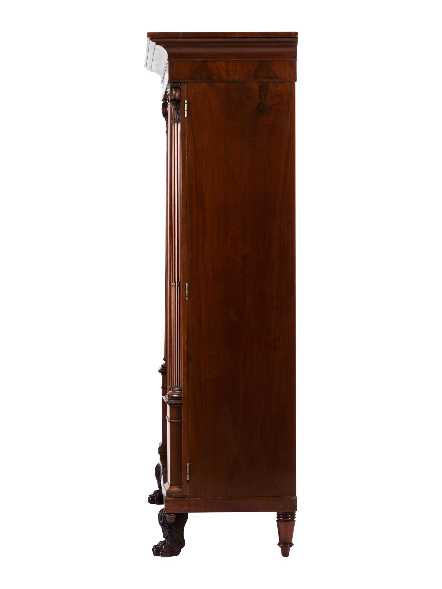 A Classical Carved and Highly Figured Mahogany Wardrobe