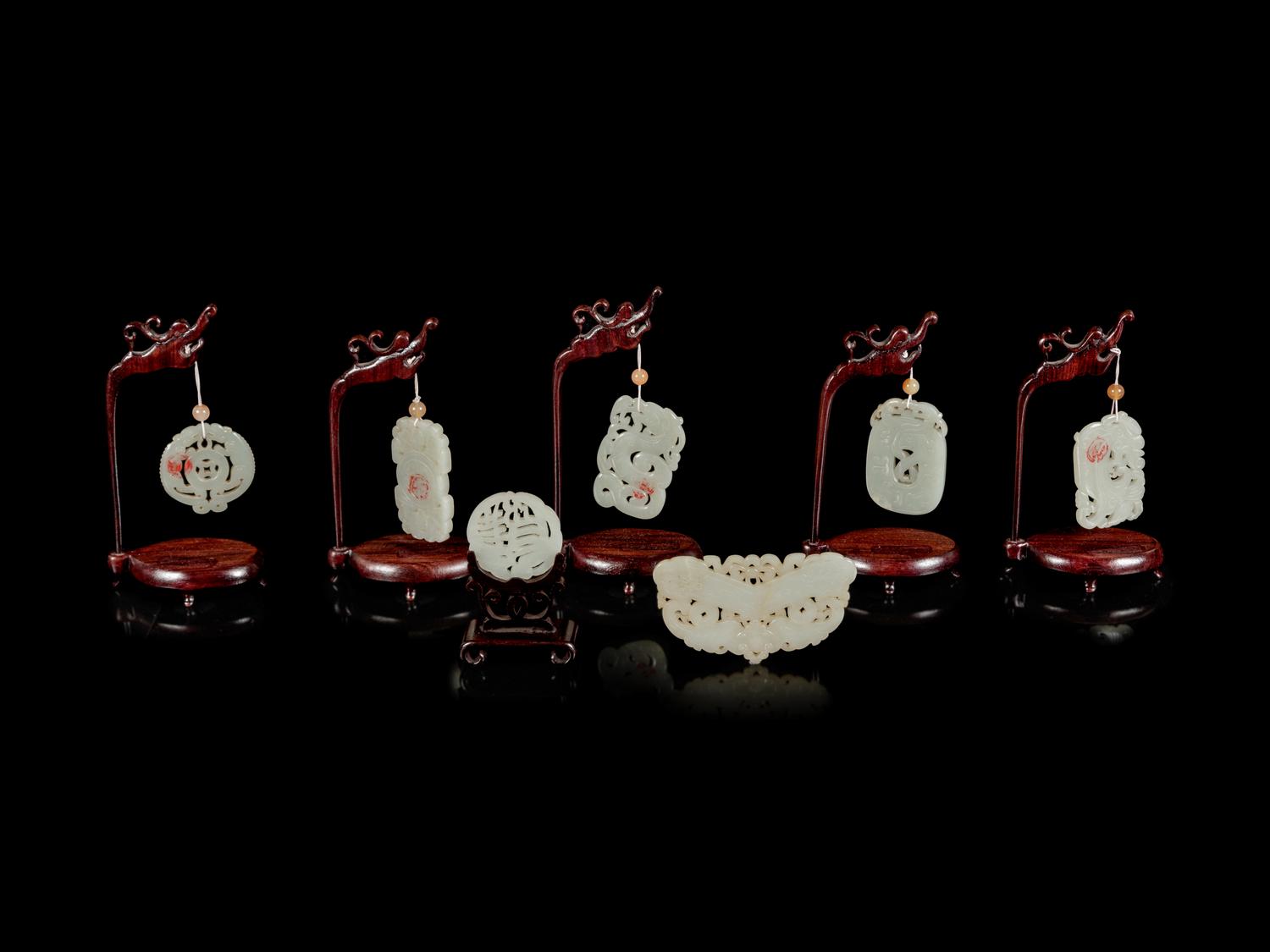Seven Chinese Pale Celadon Jade Pendants