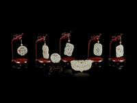 Seven Chinese Pale Celadon Jade Pendants