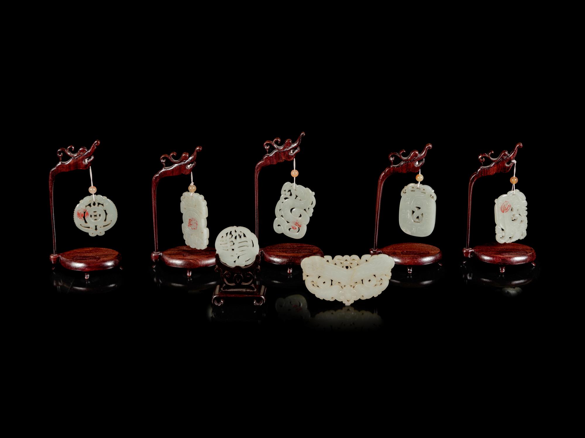 Seven Chinese Pale Celadon Jade Pendants