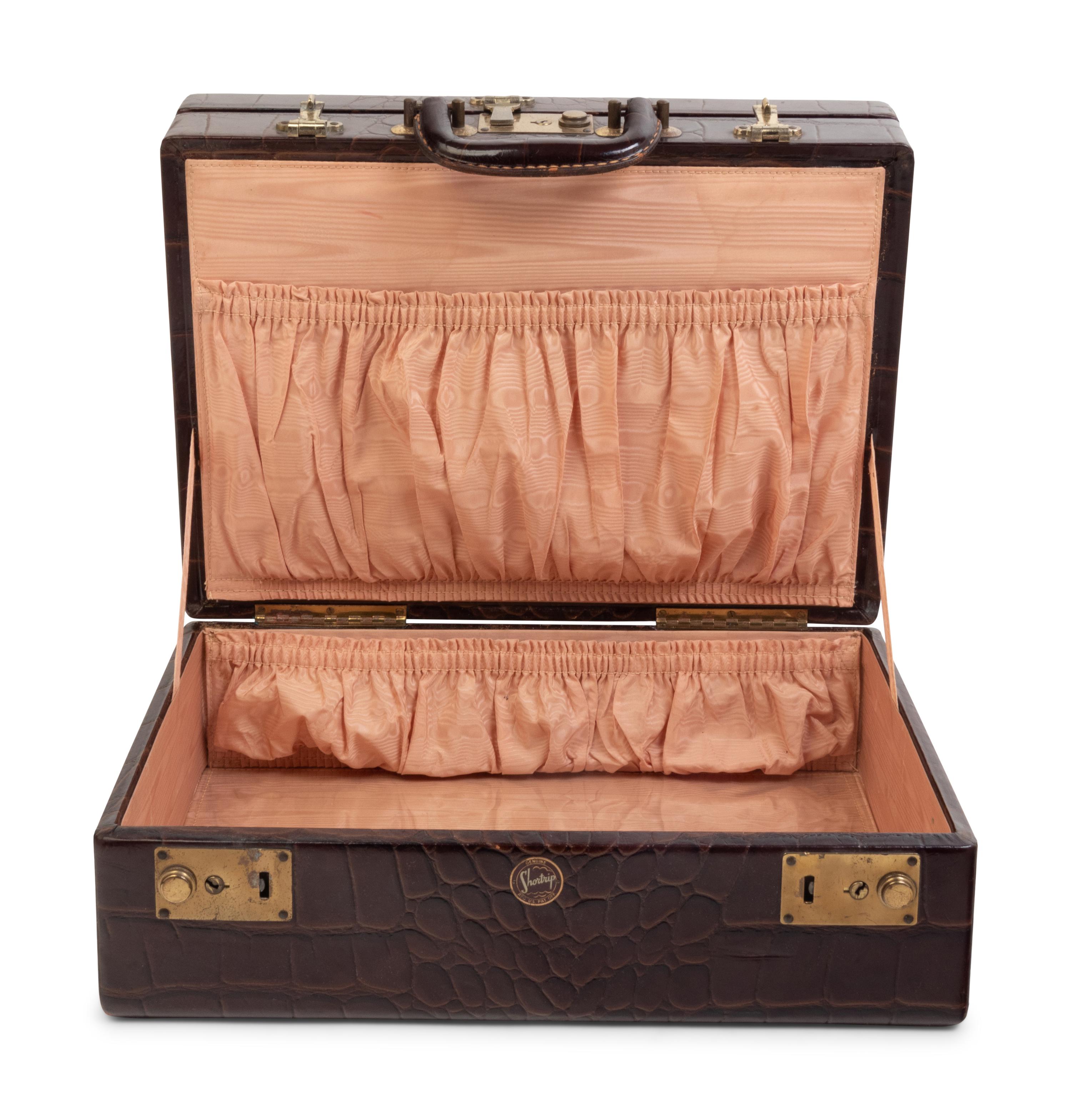 Two Leather Veneered Valises
