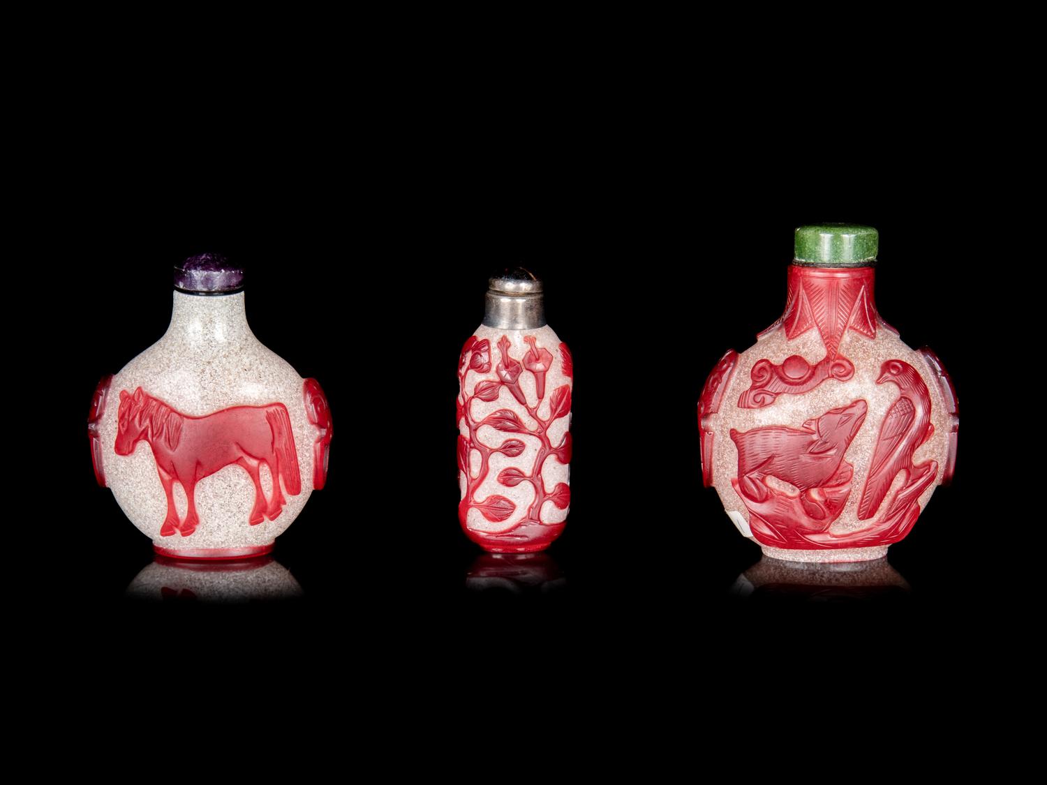 Three Chinese Red Overlay Snow Flake Ground Peking Glass Snuff Bottles