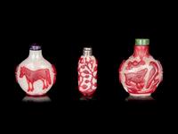 Three Chinese Red Overlay Snow Flake Ground Peking Glass Snuff Bottles