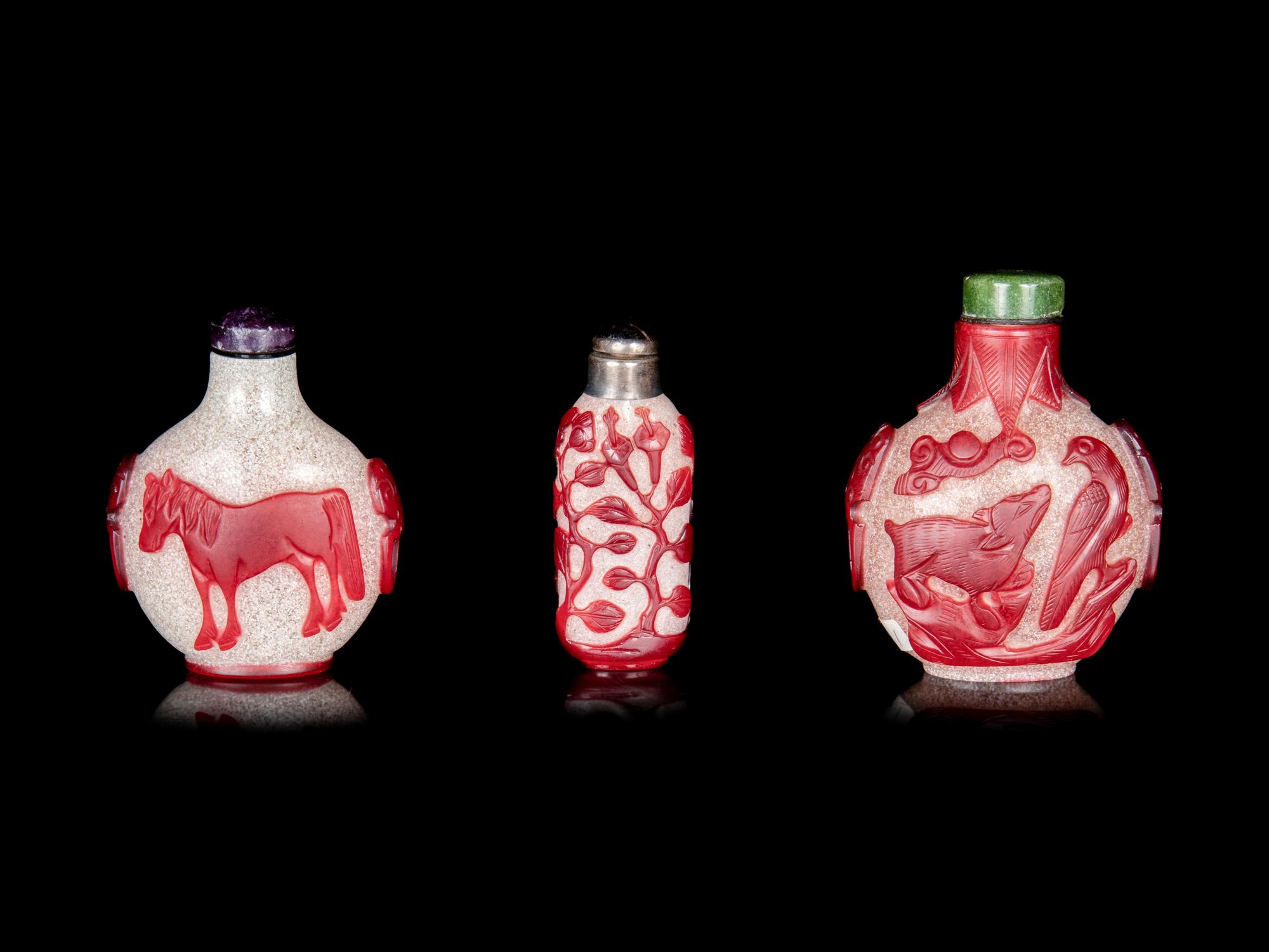 Three Chinese Red Overlay Snow Flake Ground Peking Glass Snuff Bottles