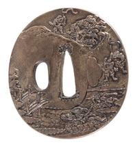 A Copper Tsuba Height 2 3/4 inches.