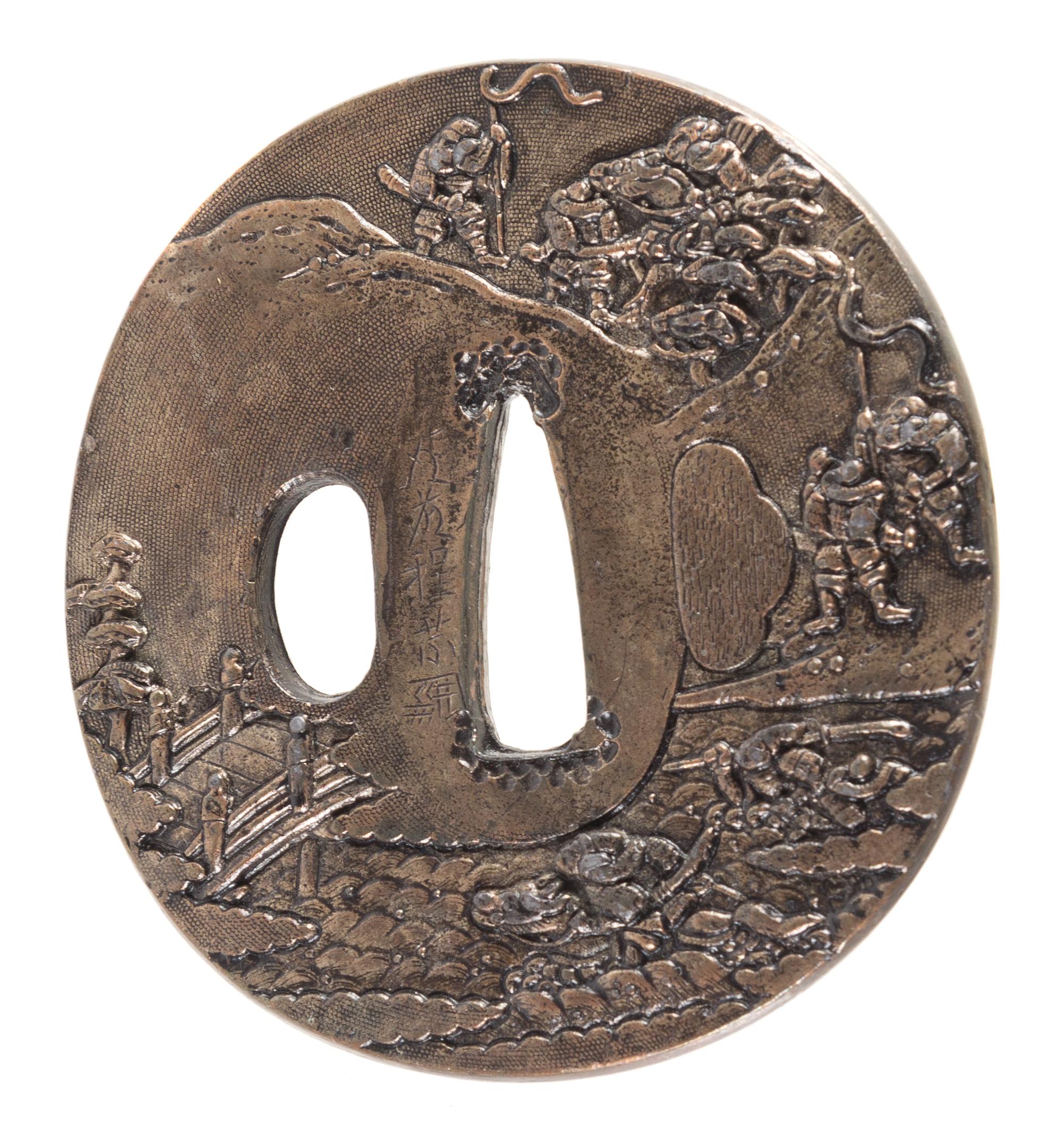 A Copper Tsuba Height 2 3/4 inches.