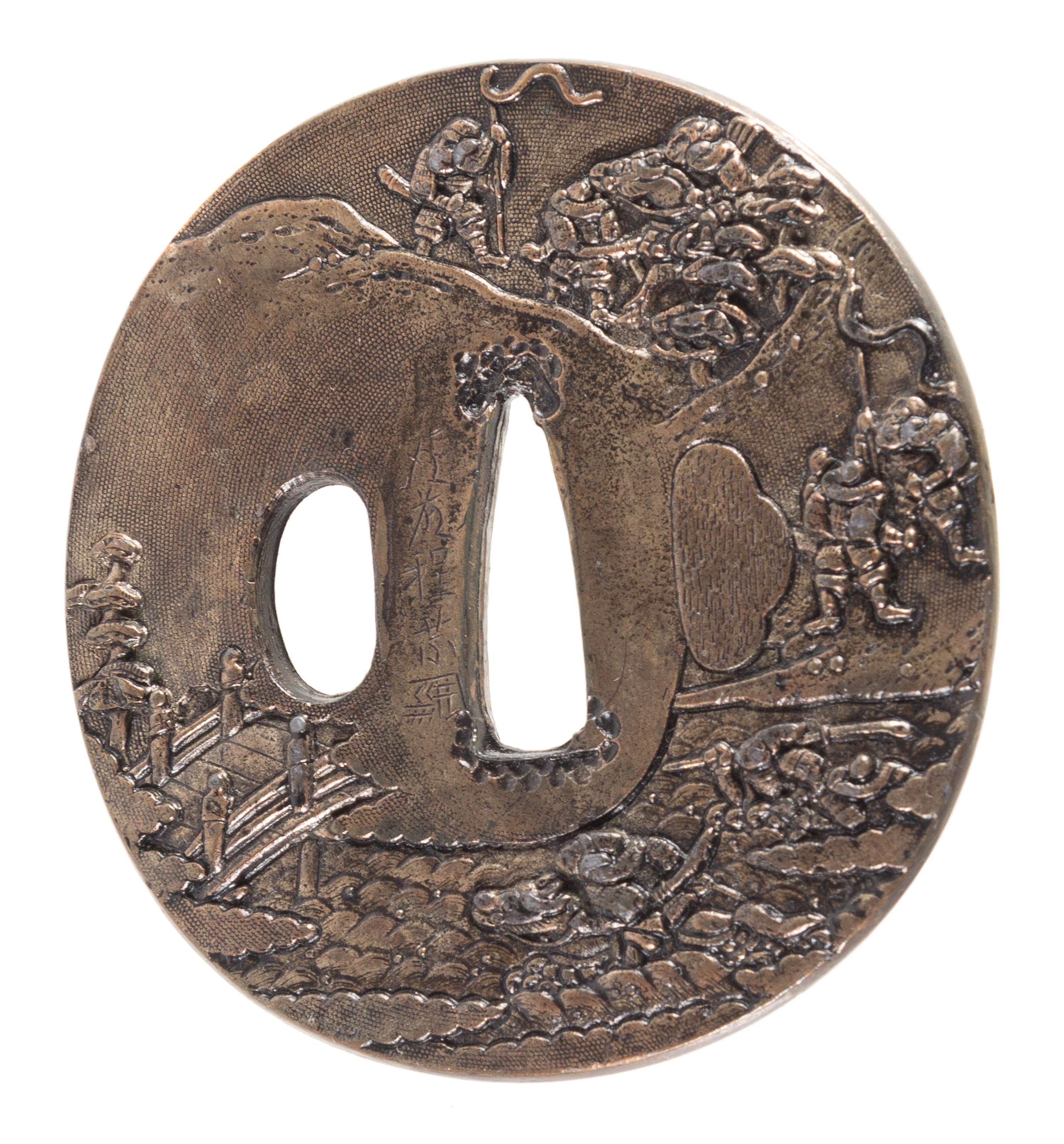 A Copper Tsuba Height 2 3/4 inches.