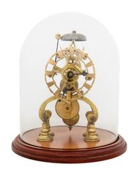 An English Brass Fusee Skeleton Clock and Cloche