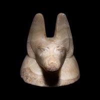 An Egyptian Alabaster Head of a Jackal