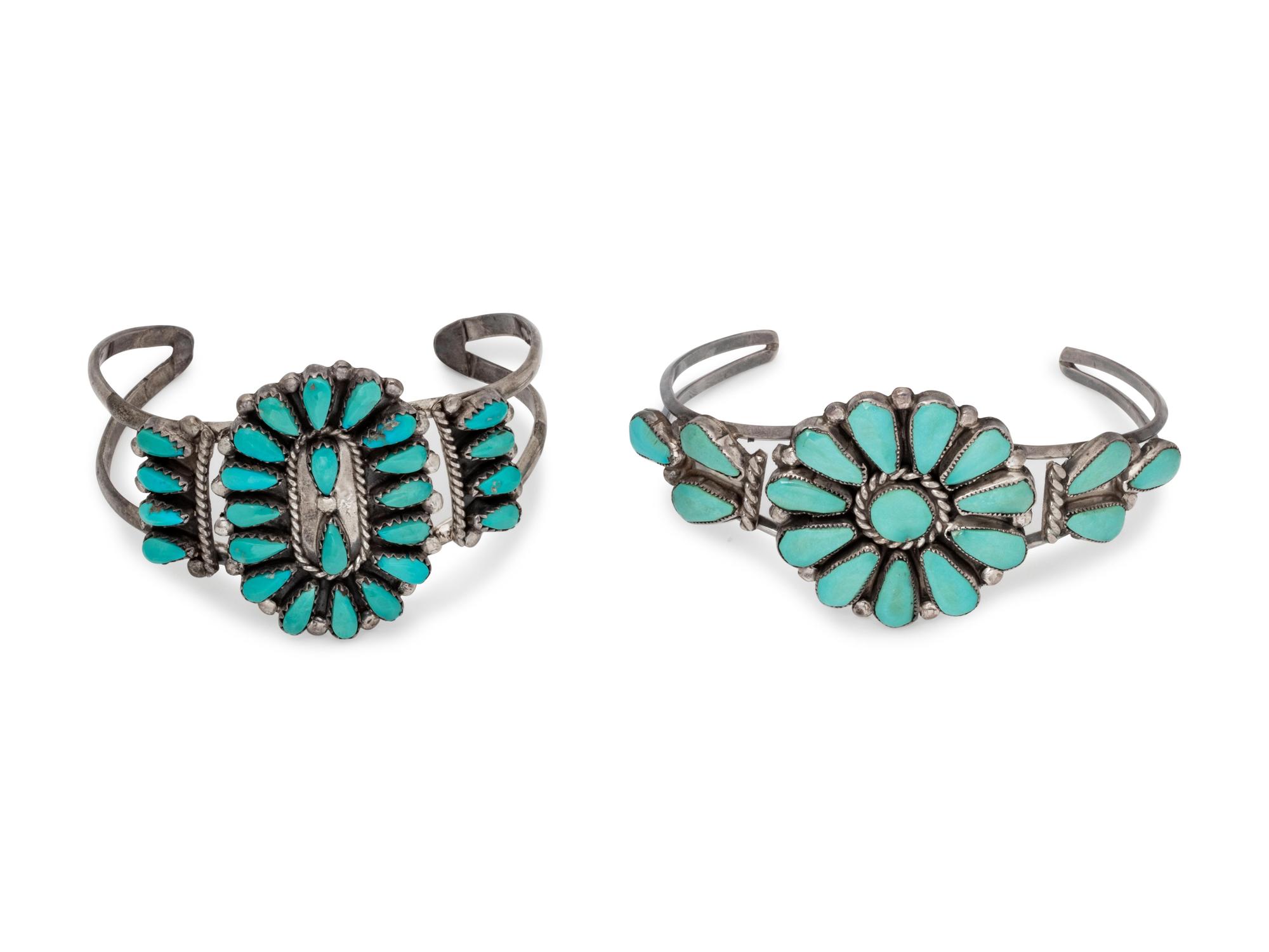 A Collection of Silver and Turquoise Cuff Bracelets,