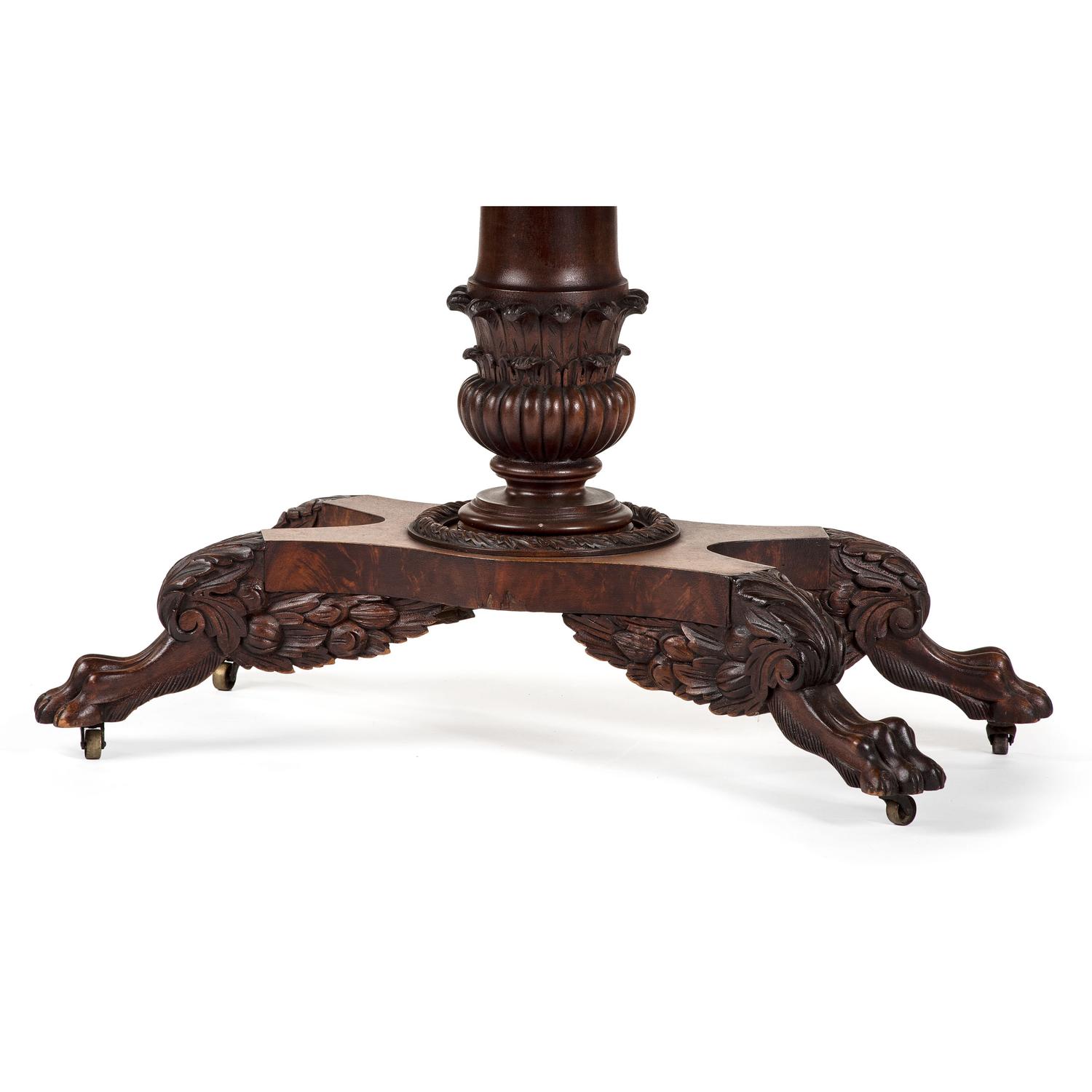 A Classical Carved Mahogany Claw-Foot Game Table
