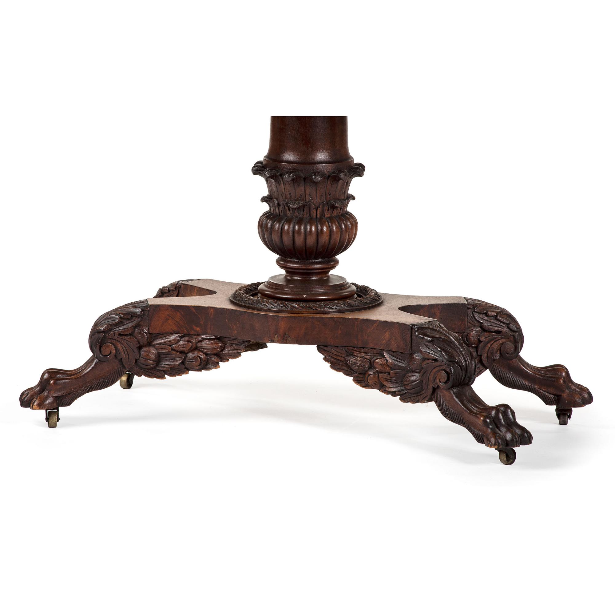 A Classical Carved Mahogany Claw-Foot Game Table