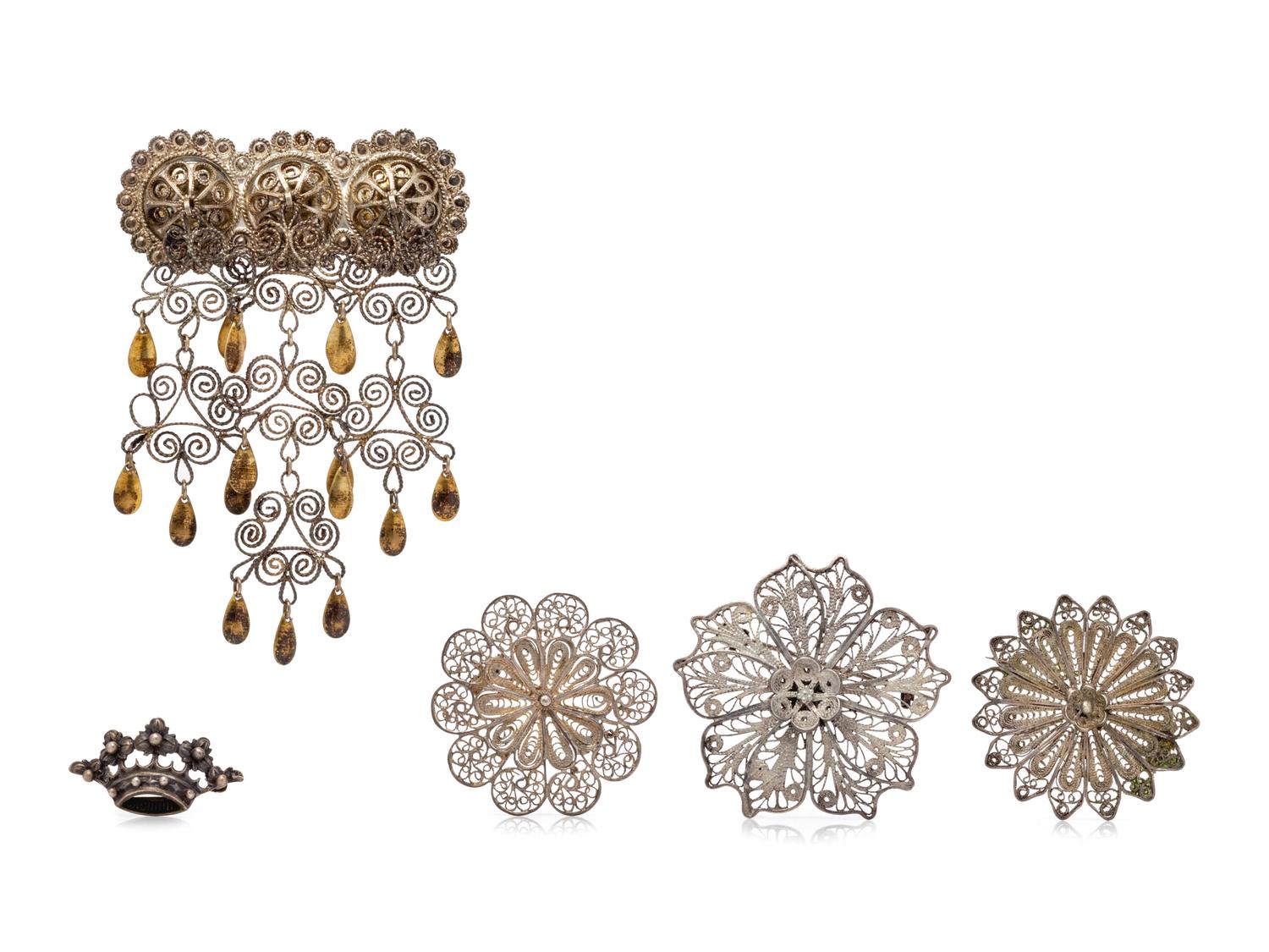 A Collection of Silver Brooches,