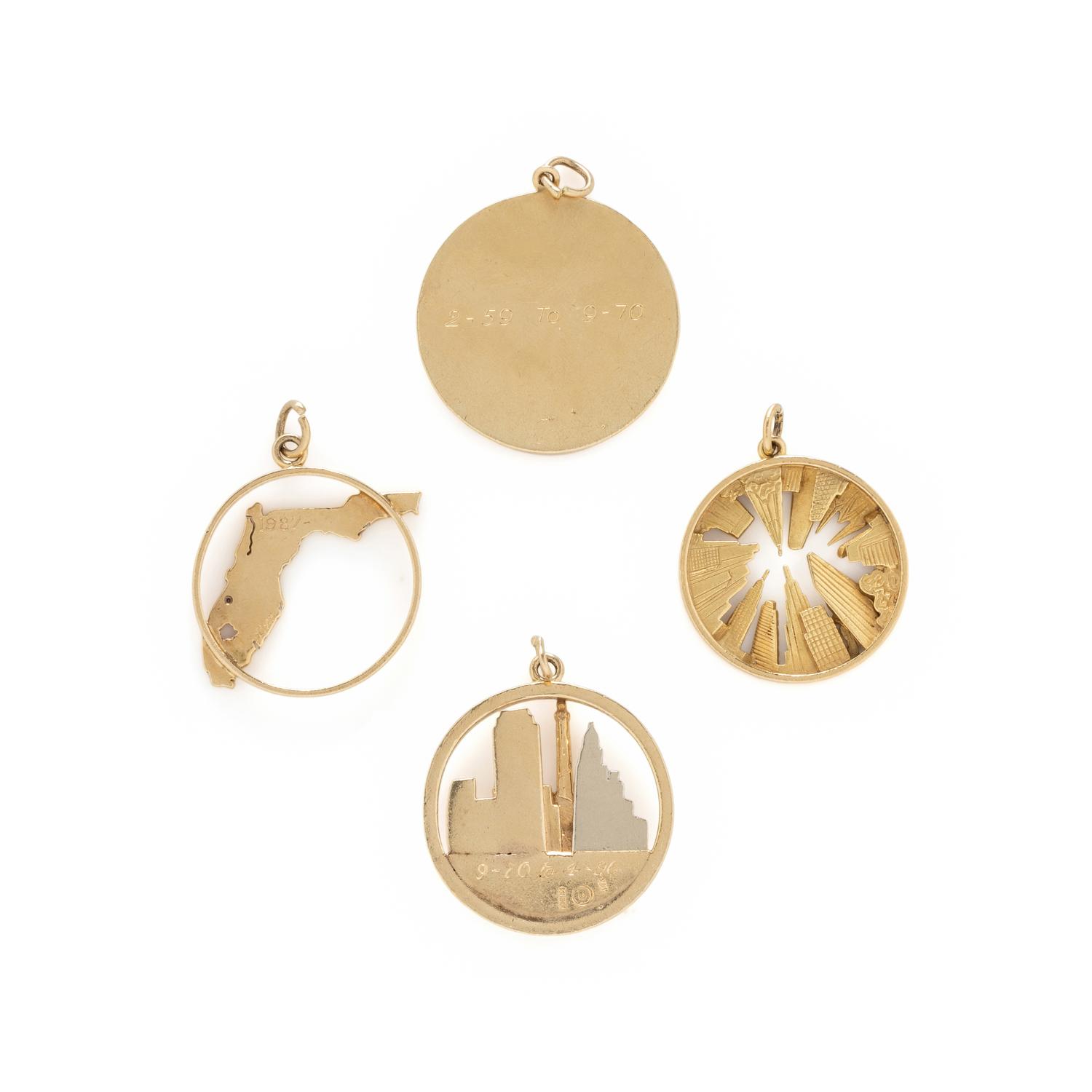COLLECTION OF YELLOW GOLD CHARMS