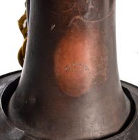 Civil War US Regulation bugle with original cavalry cords. Manufactured by Horstmann, Philadelphia, PA.