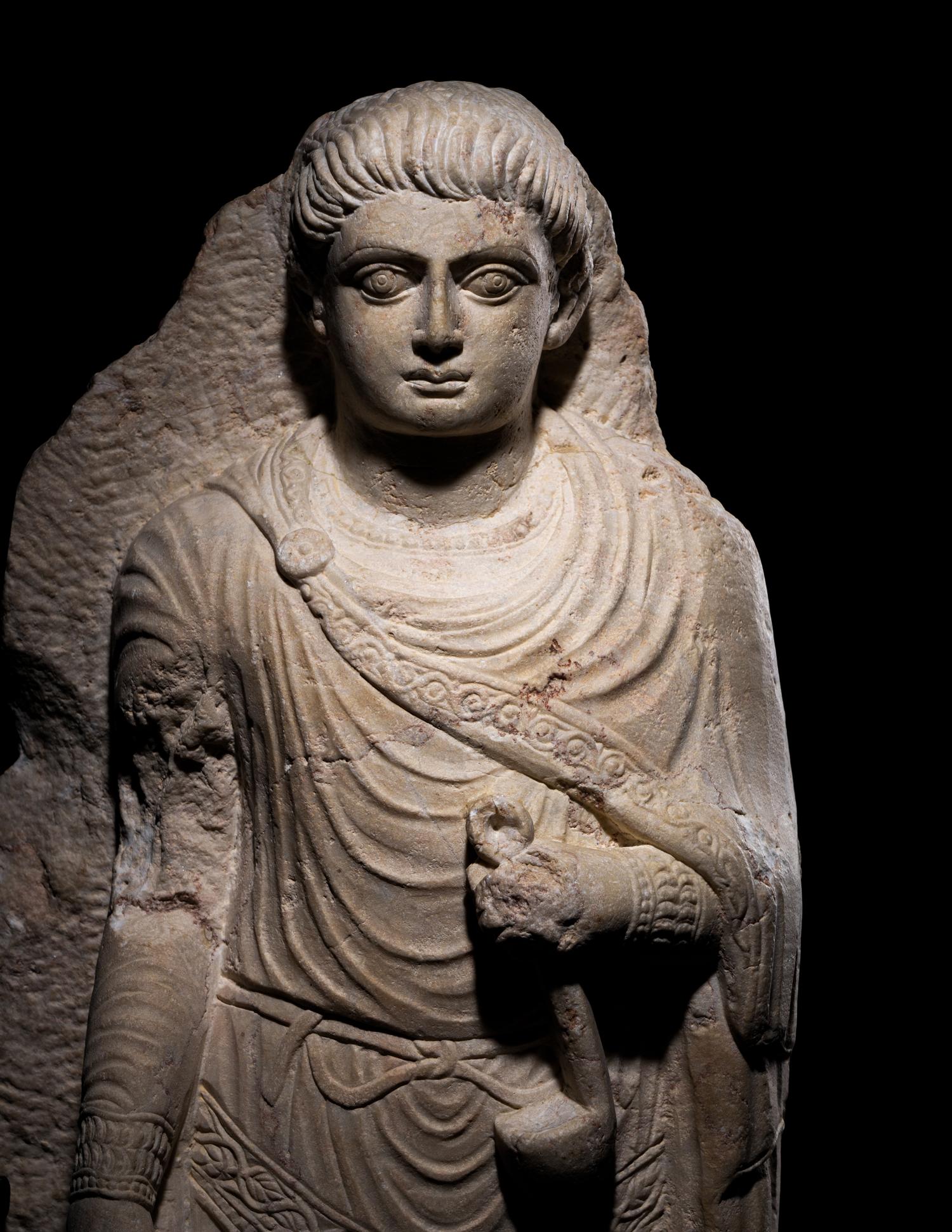 A Palmyrene Limestone Relief Fragment of a Youth