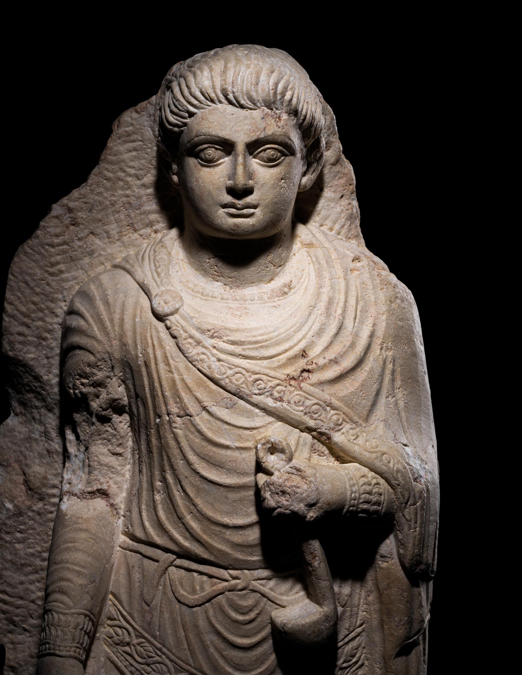A Palmyrene Limestone Relief Fragment of a Youth