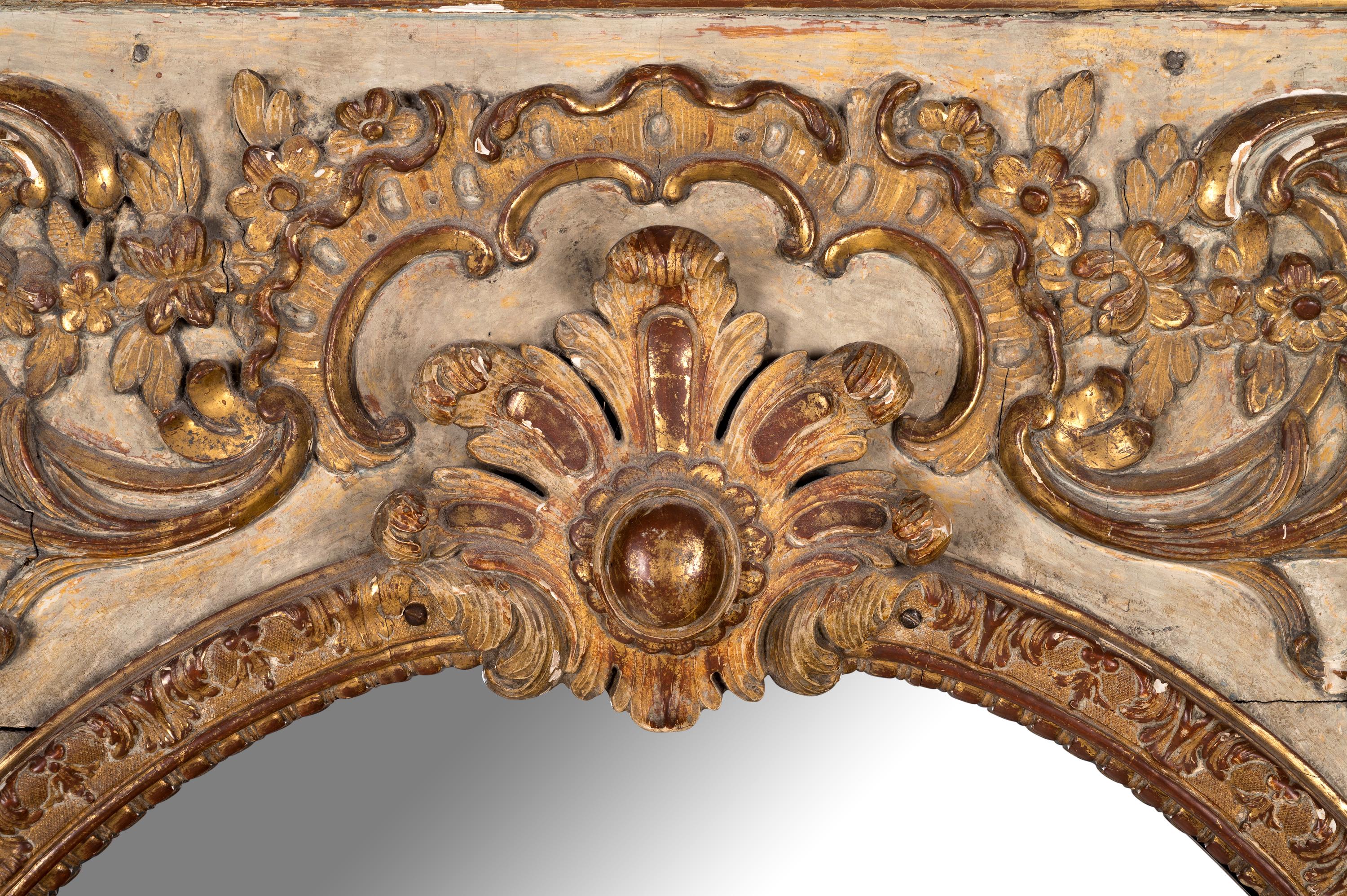 An Italian Painted and Parcel Gilt Pier Mirror