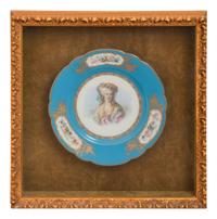 A Group of Seven Framed Sèvres Style Porcelain Plates