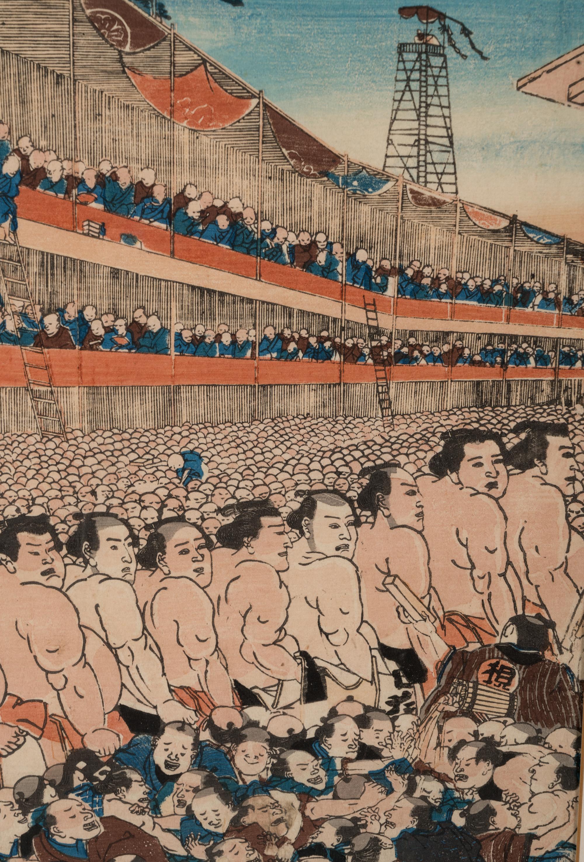 A Japanese Woodblock Triptych of a Sumo Match