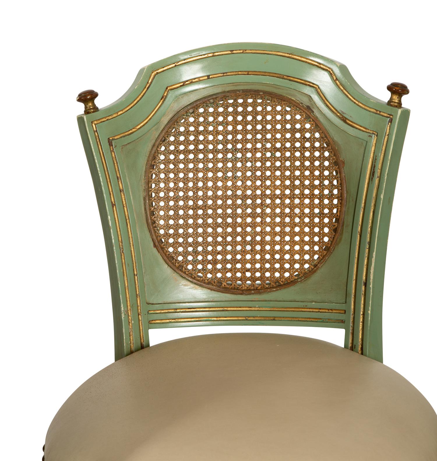 Four Louis XVI Style Painted, Parcel Gilt and Cane Back Bar Stools