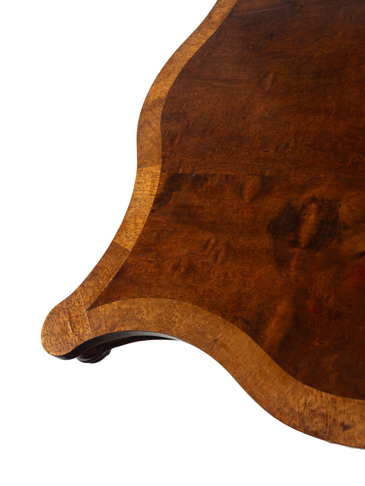 An American Classical Mahogany and Birdseye Maple Tilt-Top Table