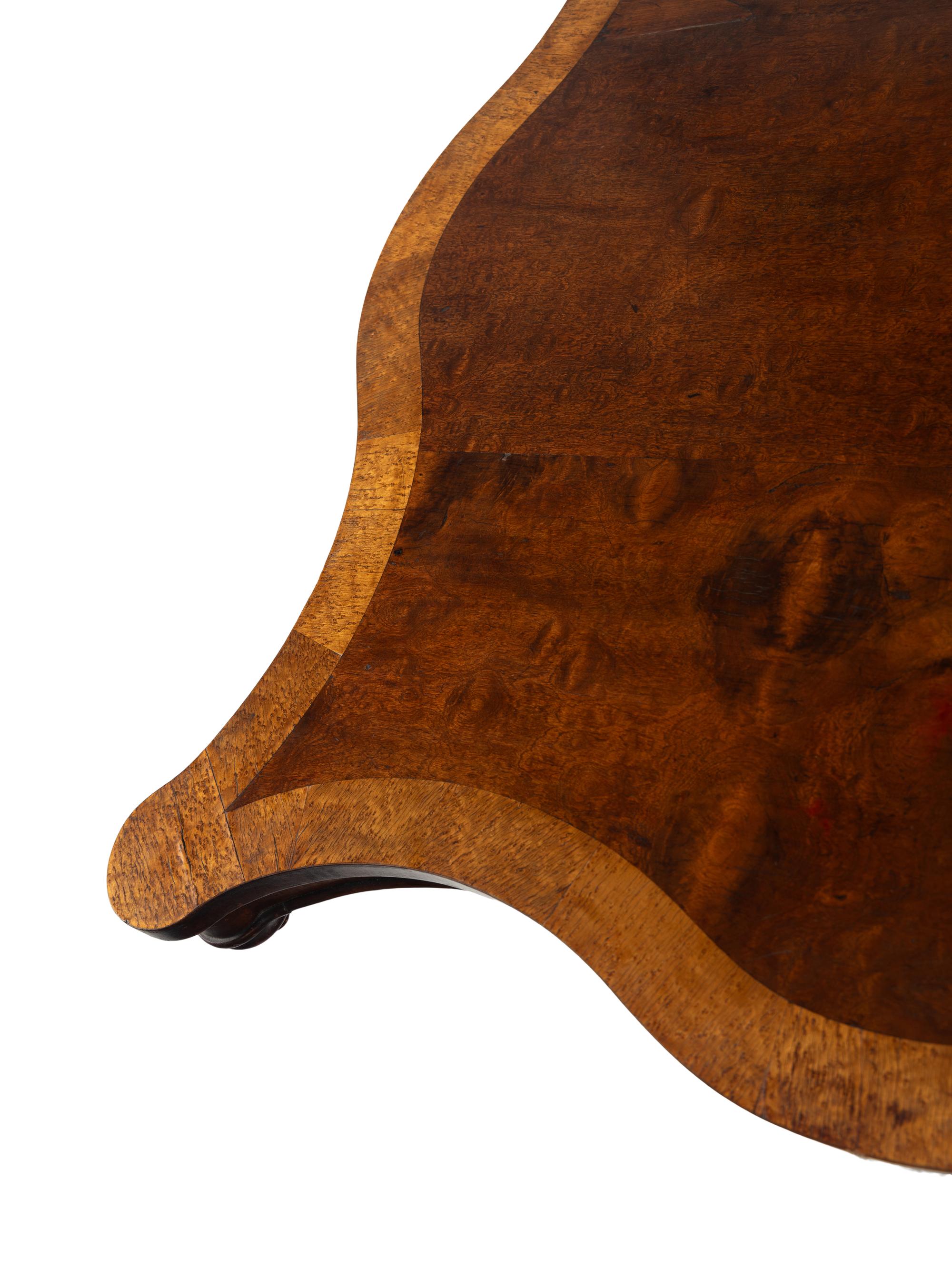 An American Classical Mahogany and Birdseye Maple Tilt-Top Table