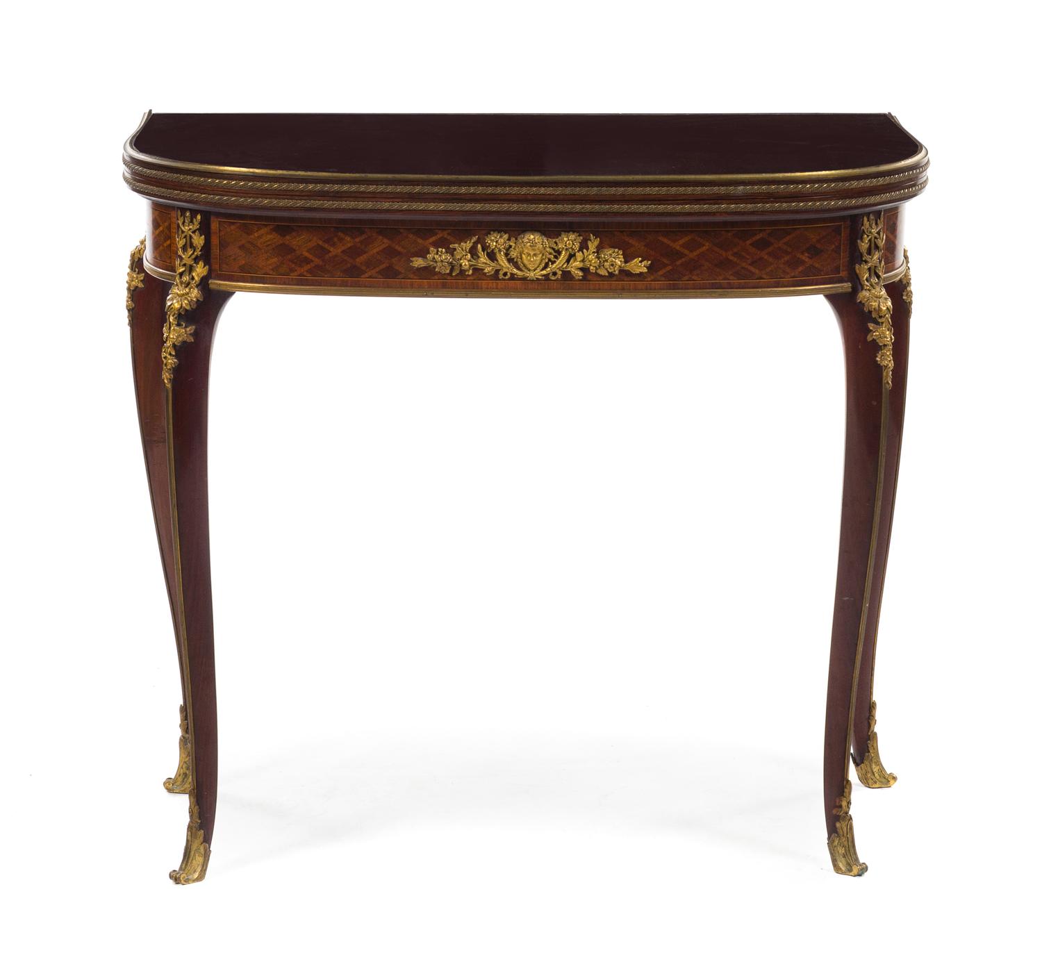 A French Gilt Bronze Mounted Kingwood and Parquetry Games Table Height 30 1/2 x width 33 1/8 x depth 16 1/4 inches. — LATE 19TH CENTURY