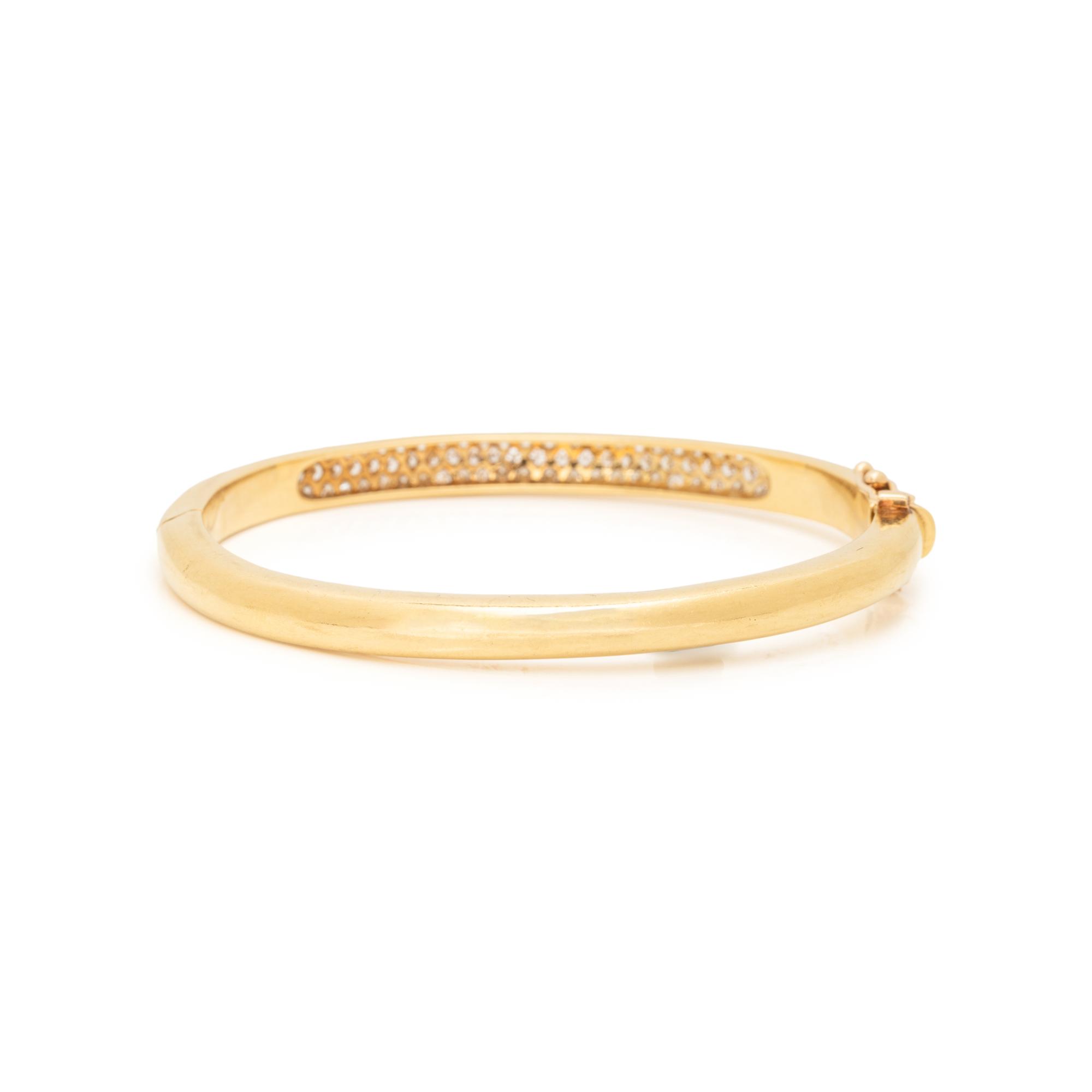 CARTIER, YELLOW GOLD AND DIAMOND BANGLE BRACELET