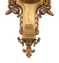 A French Carved Giltwood Clock and Barometer