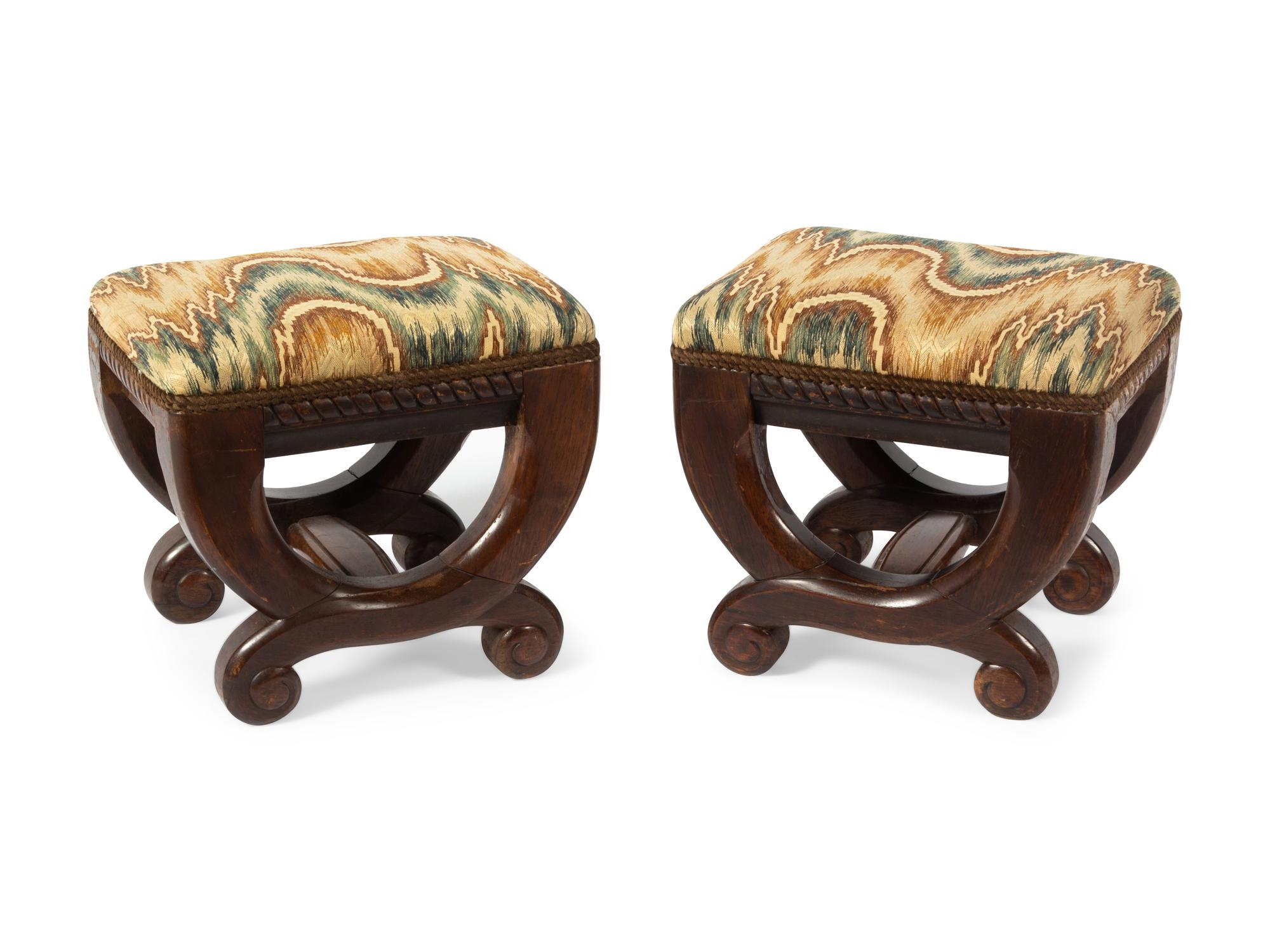 A Pair of Continental Carved Tabourets