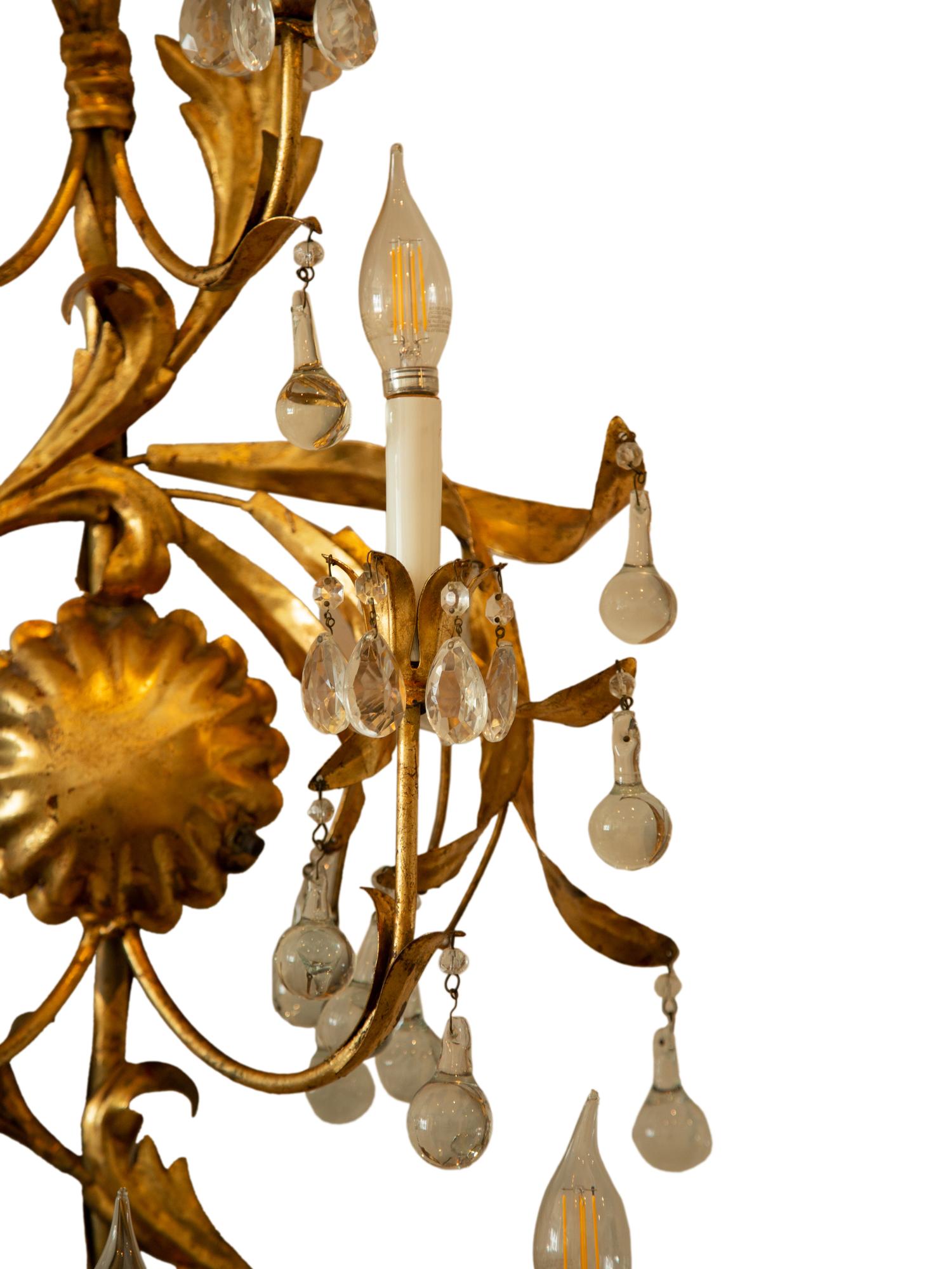 A Pair of Italian Gilt Tole Seven-Light Sconces