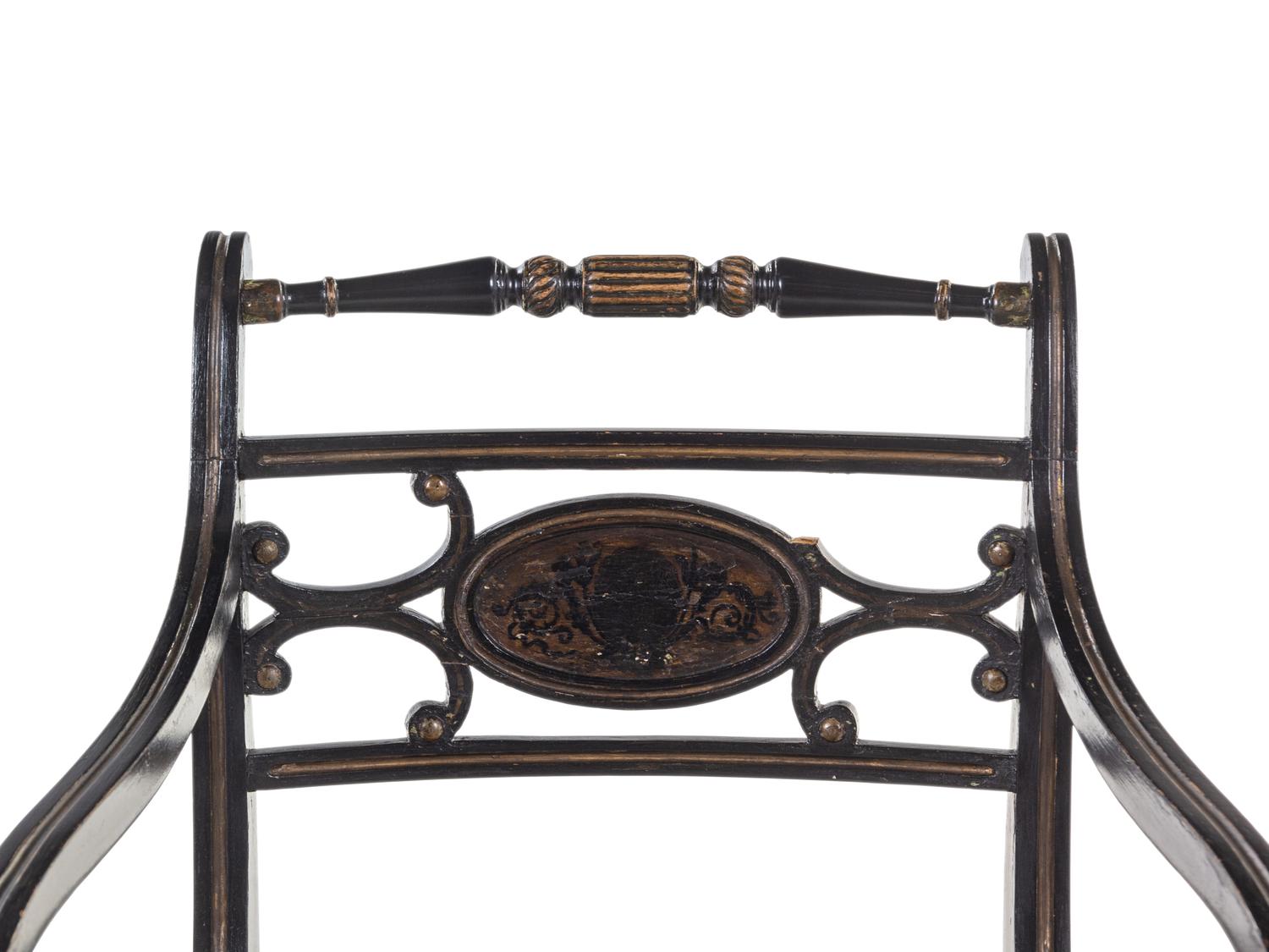 A Regency Painted and Parcel-Gilt Cane Seat Armchair