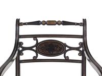 A Regency Painted and Parcel-Gilt Cane Seat Armchair