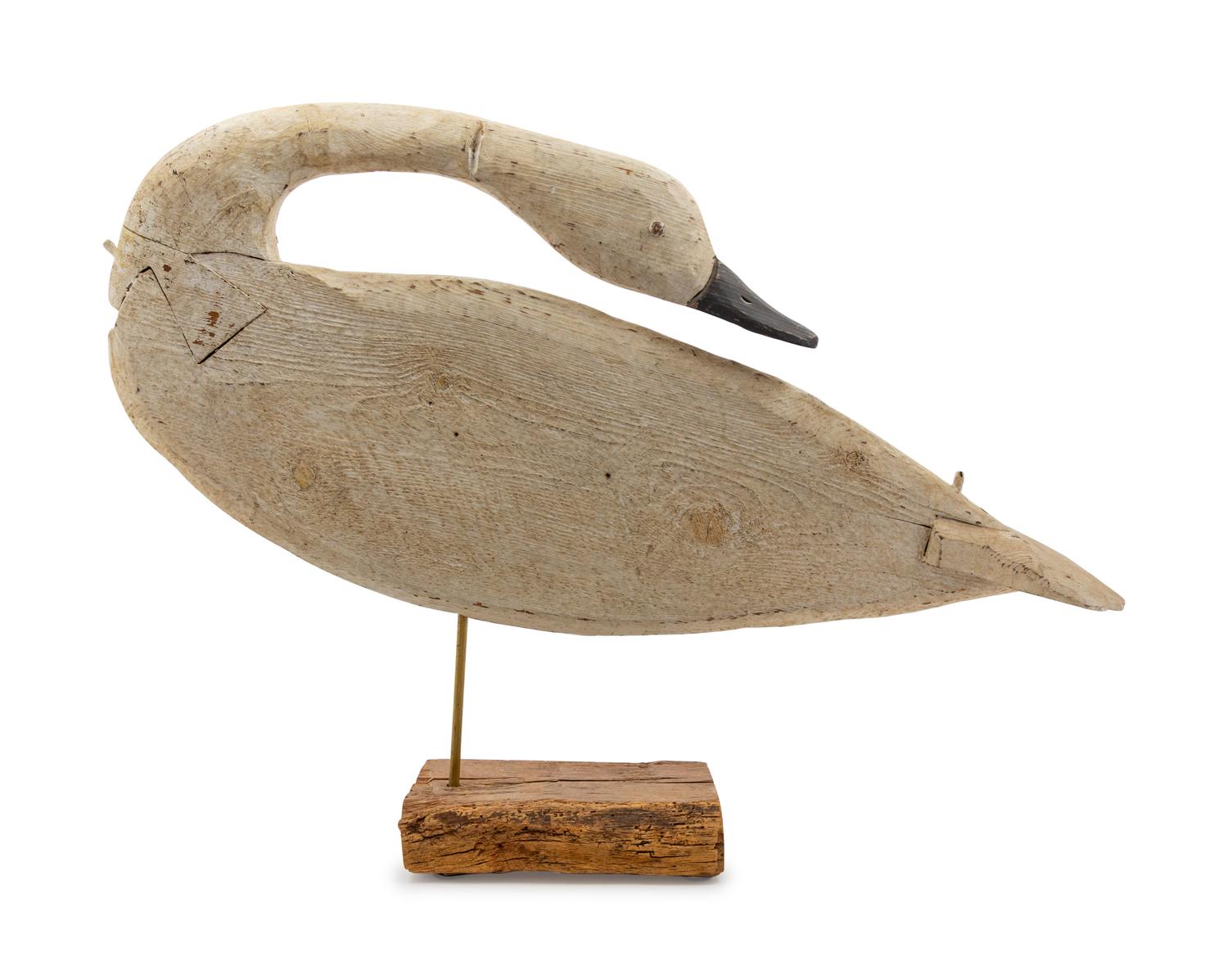 A Carved and Painted Goose Decoy